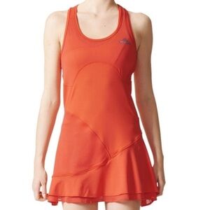 Vibrant orange athletic tennis dress by Stella McCartney  x Adidas Small $250